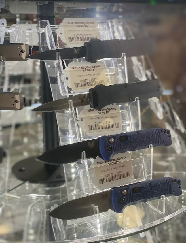 Knives staked at a shelf in H&H Shooting Sports in Oklahoma City